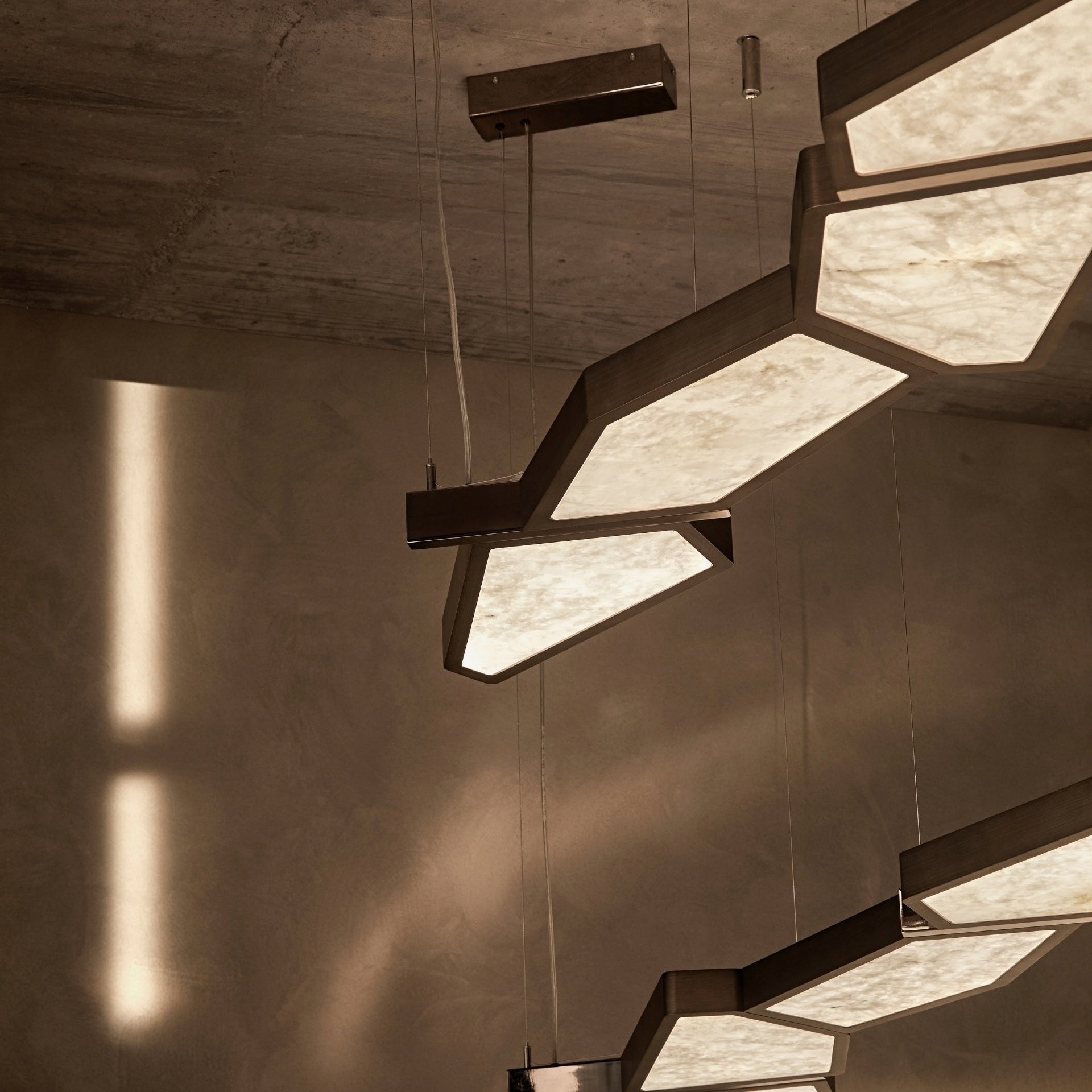 Backlit onyx modern suspension lamp with bronze 