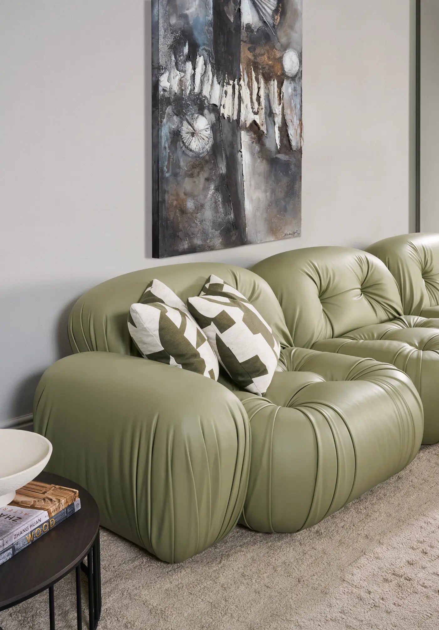 Modern green leather sofa in midcentury style camaleonda 