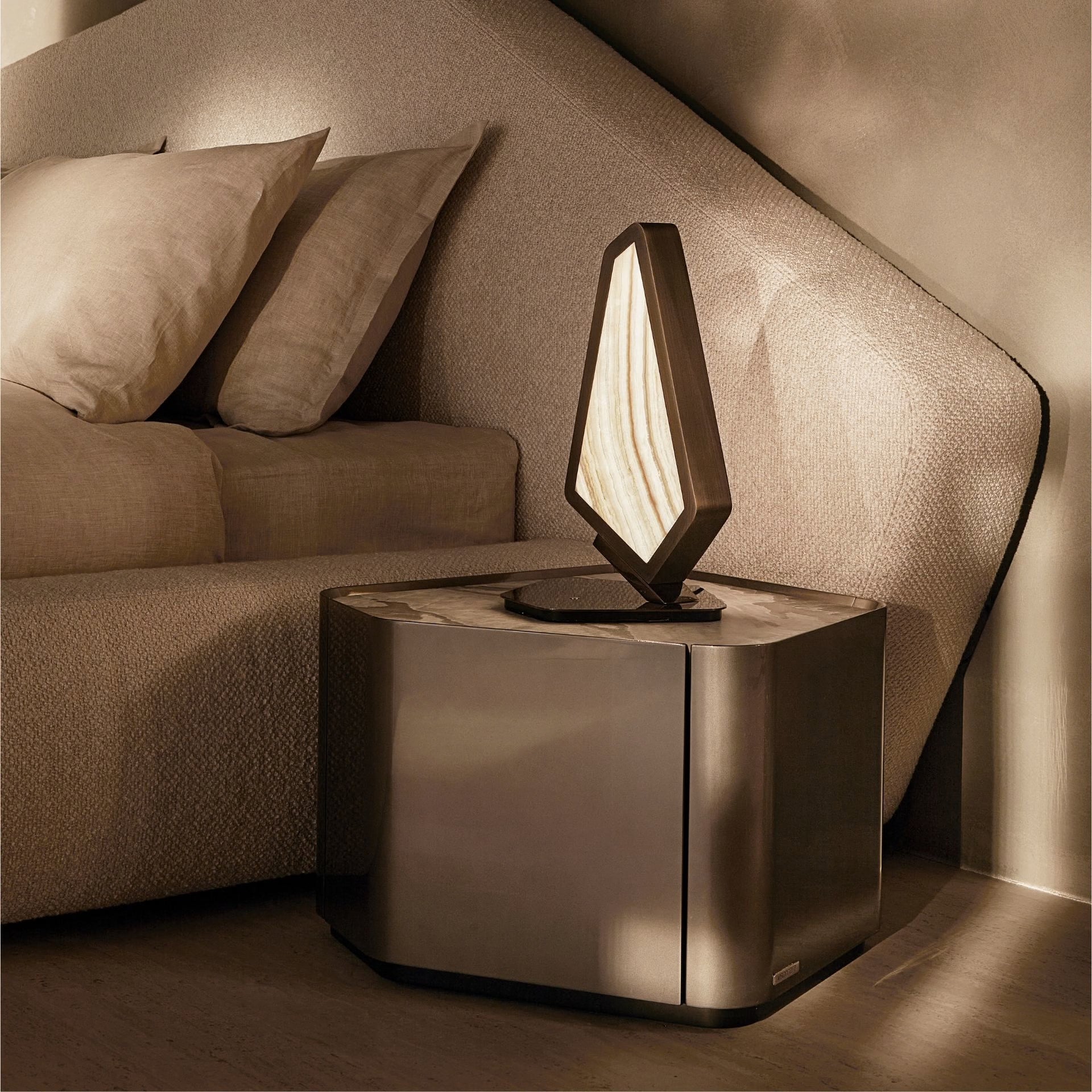 Modern side table with a lamp next to a sofa