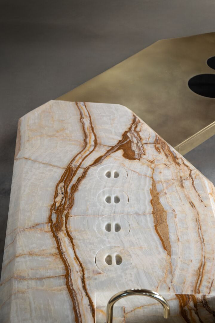 Onyx kitchen countertop with brass details 