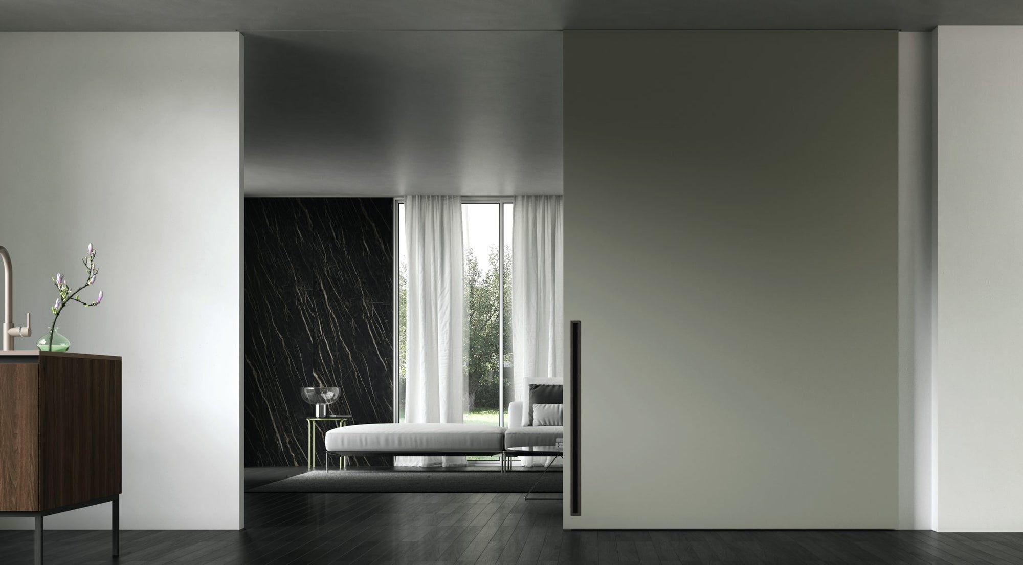 Modern interior design with extra large recessed pocket door flush with ceiling