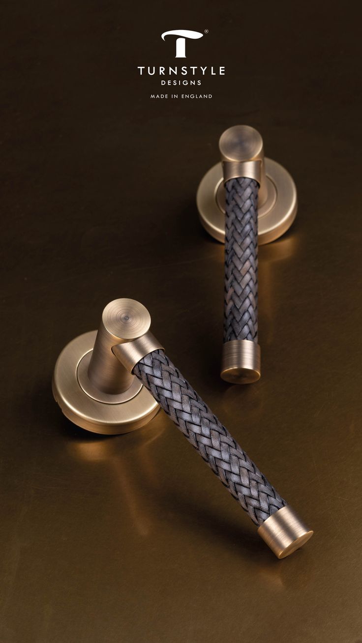 Turnstyle Designs door handles with woven design on a dark background