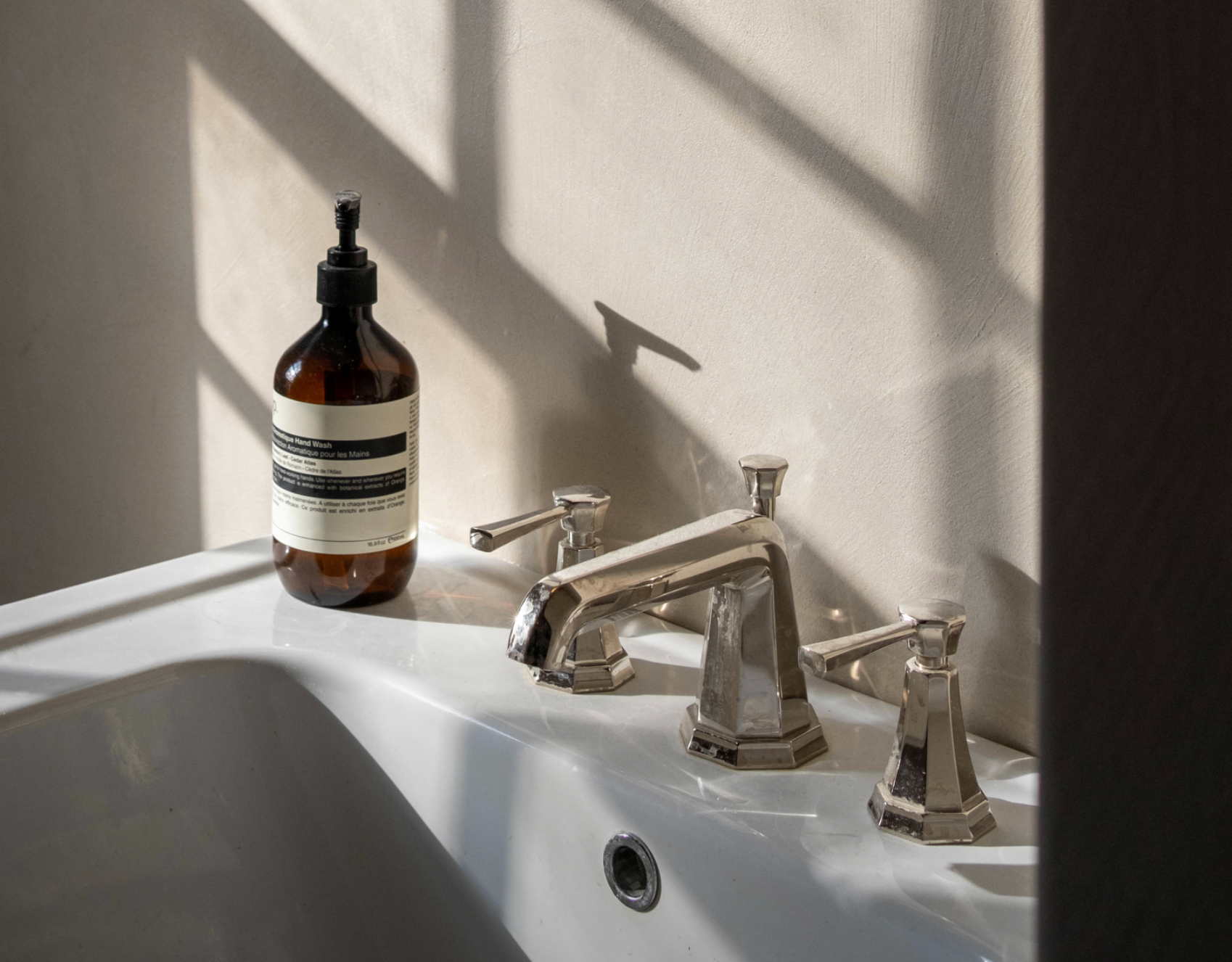 Bathroom sink with chrome art deco faucet 
